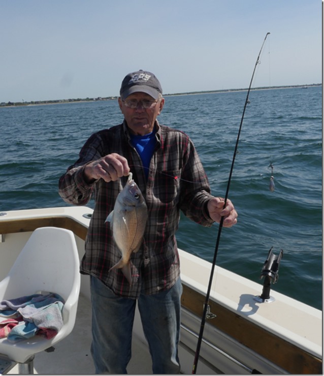 captain earl catches a scup on the ri fishing charter