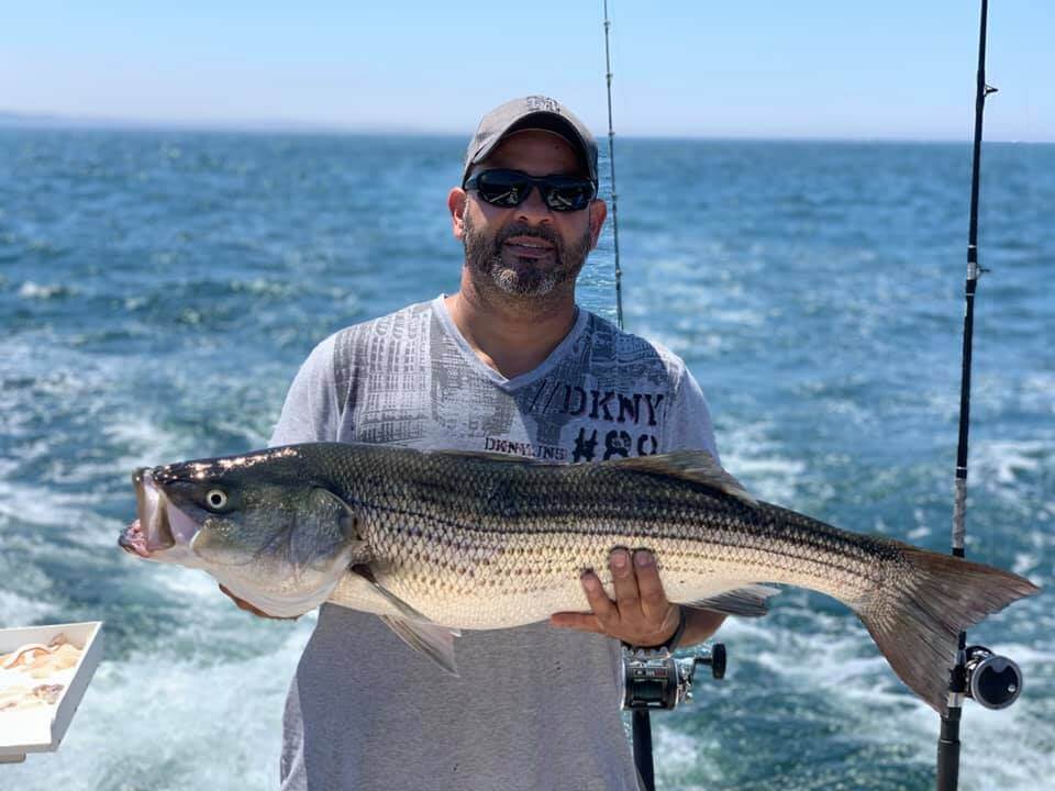 aces wild Rhode island striped bass fishing charters R5